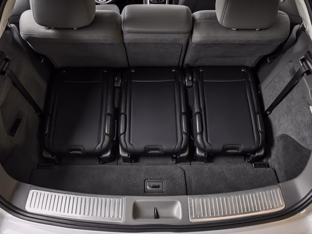 three-across_car_seat_installation_with_compact_sedan
