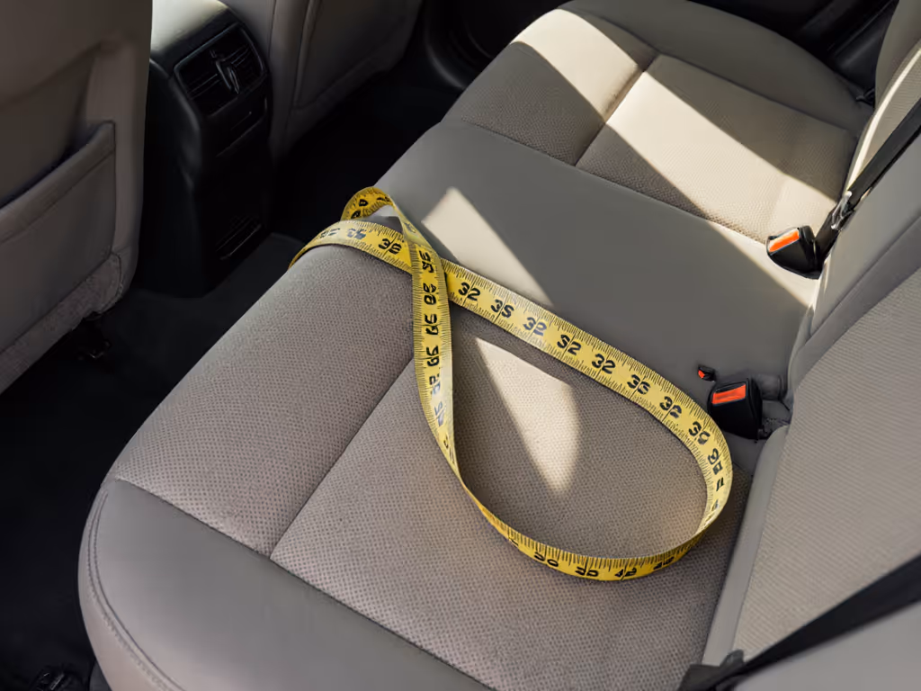 compact_car_backseat_with_measuring_tape